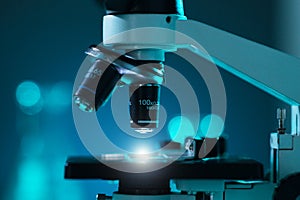 Close-up of scientific microscope. Laboratory in hospital. Epidemic disease, healthcare, vaccine research and