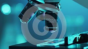 Close-up of scientific microscope. Laboratory in hospital. Epidemic disease, healthcare, vaccine research and