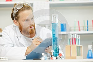 close up scientist in lab uniform