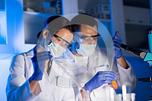 Close up of scientists making test in lab