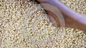 Close up of Scooping Bulgur Wheat