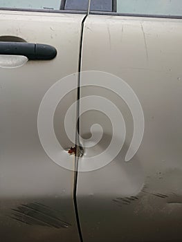 Close up scratch at gray car body