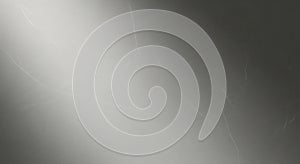 Close-up of a scratched metallic surface with light reflections