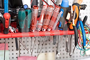 Close up of screwdrivers and pliers on the table