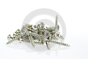 Close-up of screws on a white