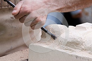 Close up of a sculptor at work