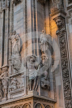 Close up of sculpture that decorating around Duomo  di Milano church in the early morning, Milan Italy