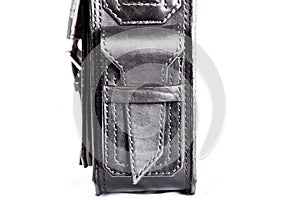 Close-up of a seam floss on a briefcase