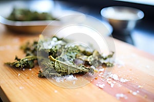 close-up of seasoned kale chips with sea salt