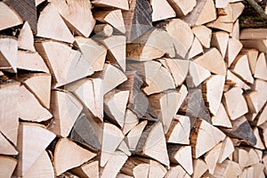 Close up of seasoned logs for woodburner