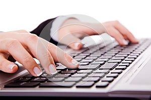 Secretary hand touching computer keys during work