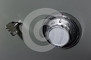 Close-up of security lock and key of safe.