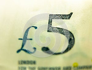 Close up selective focus of five pound note ÃÂ£5