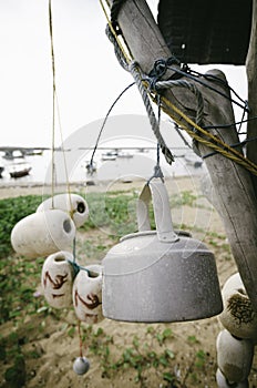 Close up and selective focus image of hanging white fish net buoy