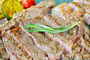 Close up and selective focus shot of beef tender steak with medium rare cooking with juicy fat, grilled and seasoning with spice,