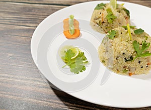 Close up selective Focus of South Indain breakfast Upma, uppumavu or uppittu on plates with Vegetables