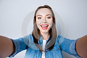 Close up self-portrait of happy brunette pretty girl with beam