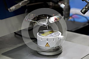 Close up of semi-automatic ultrasonic wire bonder