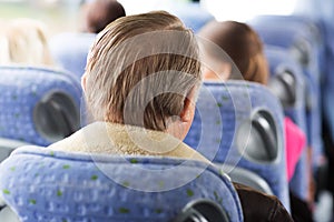 Close up of senior man sitting in travel bus