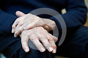 Close Up Of Senior Man Suffering With Parkinsons Diesease