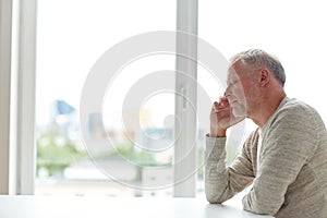 Close up of senior man thinking