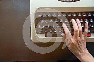 Close up of Senior secretarial typing the memo