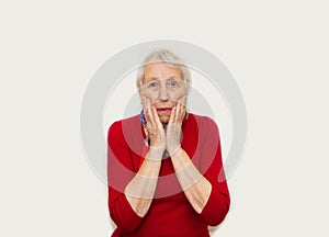 Close-up of a senior woman with horror emotion