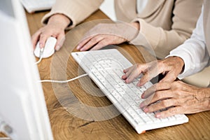 Close-up of seniors` hands