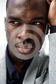 Close up serious african American man glancing