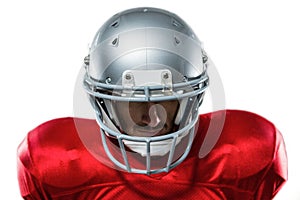 Close-up of serious American football player in red jersey looking down