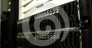 Close up of server device in server room over blurred background