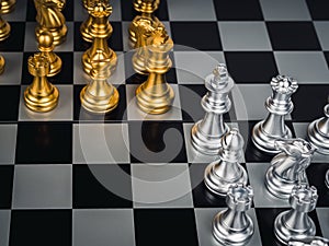 Close-up of set of golden and silver chess pieces element, king, queen rook, bishop, knight, pawn standing on chessboard.