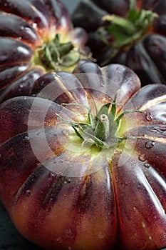 Close-up of several coeur de boeuf tomatoes (translation: beefsteak tomatoes