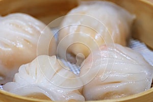 Close up of several Har gow Xia jiao in steamer