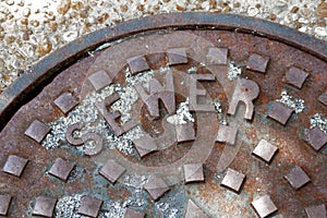 Close-up of a sewer manhole cover