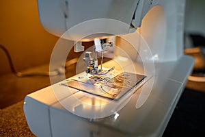 Close-up of sewing machine needle and presser foot