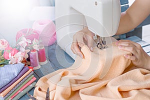 Close up of sewing machine on the table with accessory for sewing