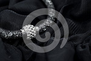 Close up of a  sexy black backgroundwith jewellery