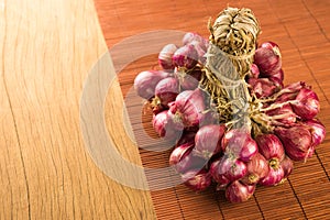 Close up shallots group on wood background