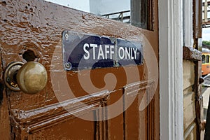 Close-up and shallow focus view of a Staff Room vintage railway sign.