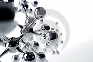Close-up of a shiny metallic molecule model against a white background