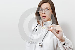 Close up shocked doctor woman in medical gown with stethoscope, glasses. Focus on clinical thermometer with high fever