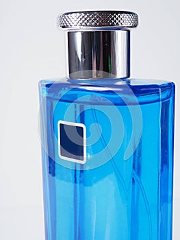 Close up shoot of blue perfume bottle