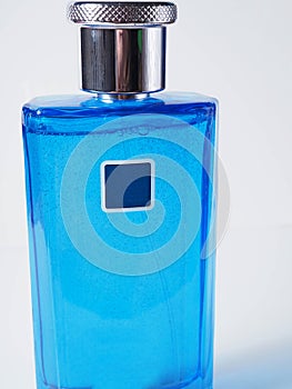 Close up shoot of blue perfume bottle