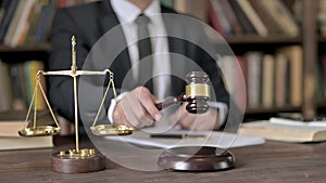 Close up Shoot of Judge Hand Banging the Gavel in Court Room