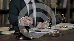 Close up Shoot of Judge Hand pointing Finger in Court Room Table