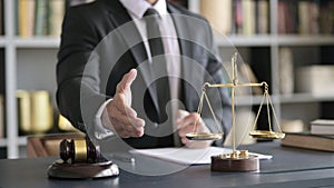 Close up Shoot of Lawyer Hand Shaking in Court Room