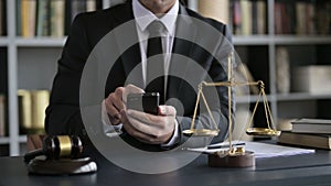 Close up Shoot of Lawyer Hand Using Smartphone in Court Room