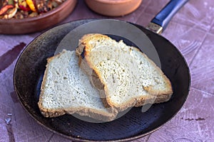 Close-up shoot of traditional homemade bread on fry-pan