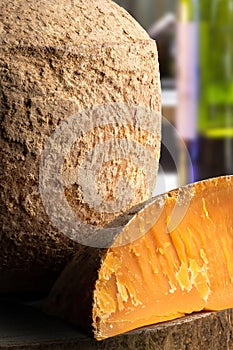 Close up shot of aged mimolette cheese